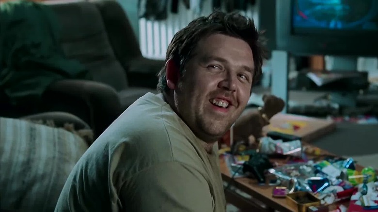 Nick Frost smiling in living room