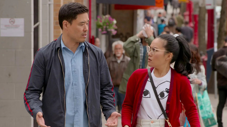 Marcus and Sasha walk down the sidewalk together