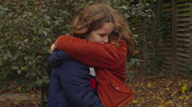 Josephine Sanz and Gabrielle Sanz hugging