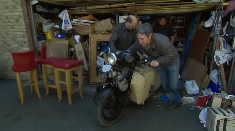 Mike wheeling a motorcycle