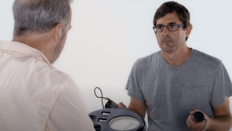 Louis Theroux with e-reader