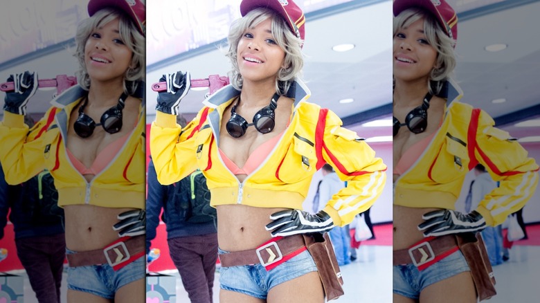 Cindy Aurum smiles with wrench