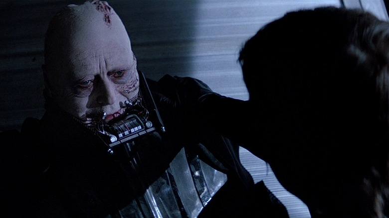 Luke comforting unmasked Darth Vader