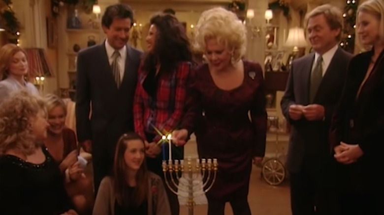 Sheffield family lighting menorah