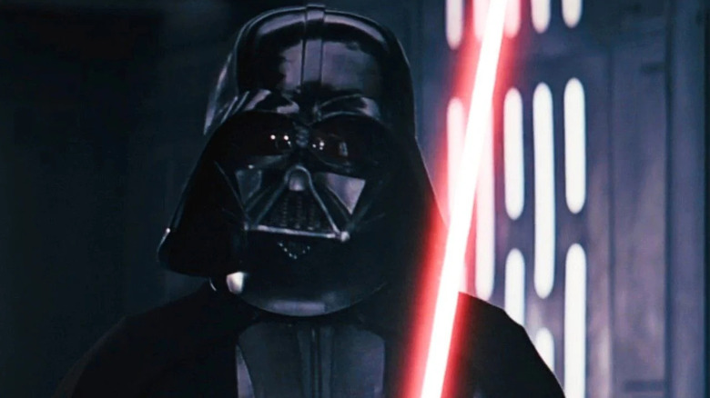 Vader holds his lightsaber