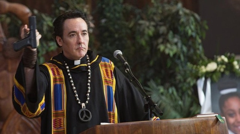 John Cusack preaching