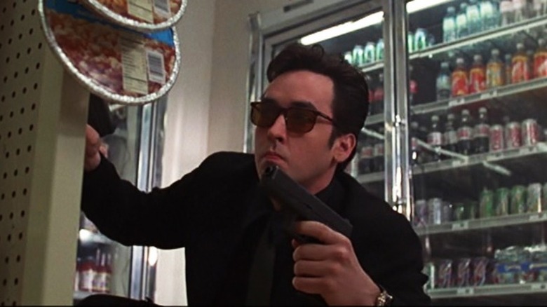 John Cusack holding gun