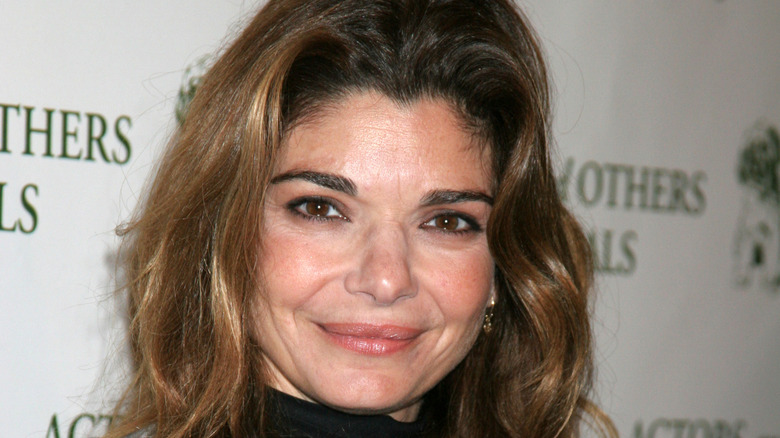 Laura San Giacomo on a red carpet