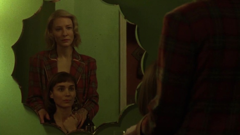 Cate Blanchett and Rooney Mara look at themselves in mirror