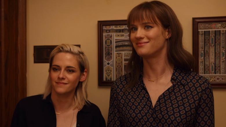 Mackenzie Davis and Kristen Stewart look ahead and smile