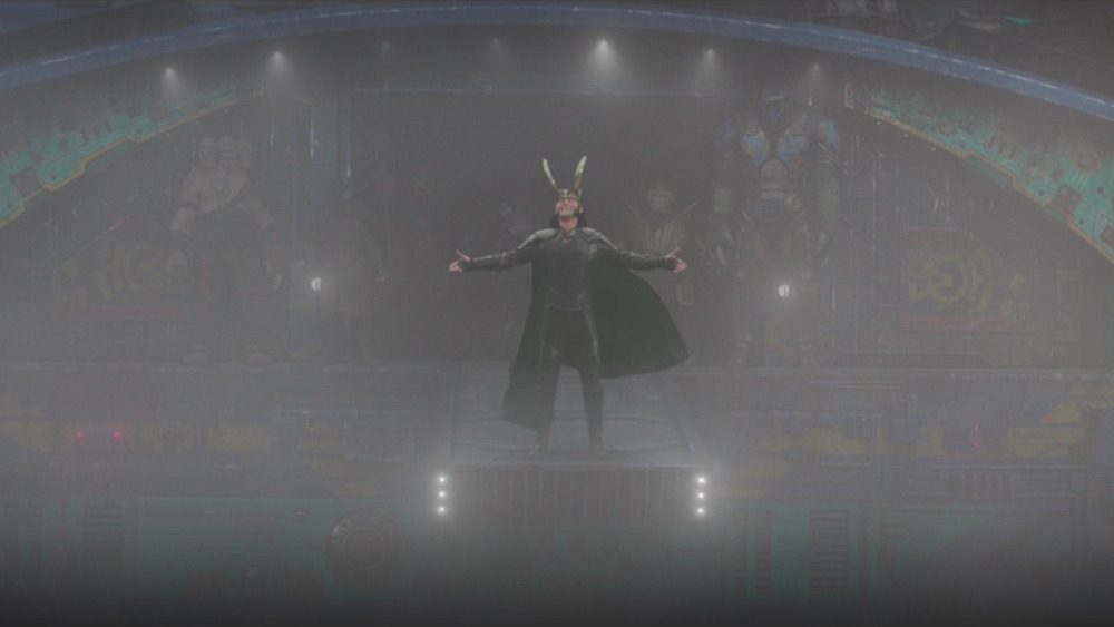 Loki with arms outstretched