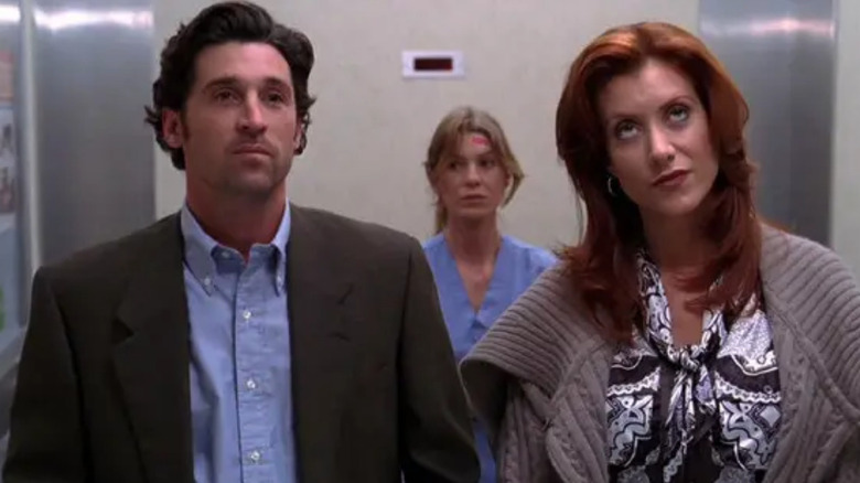 Addison, Derek, and Meredith standing in an elevator