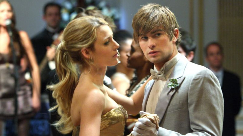 Nate and Serena dancing in a room