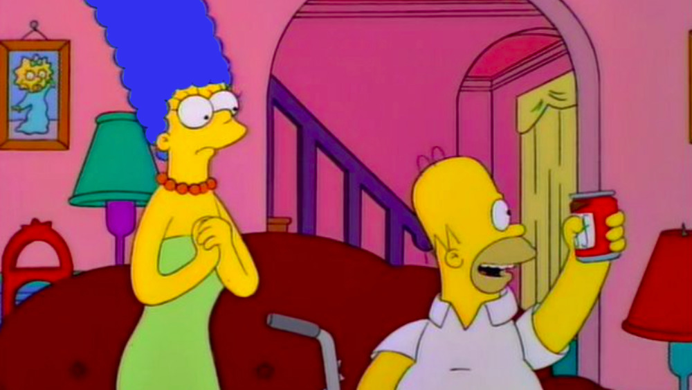 Marge and Homer Simpson on the couch