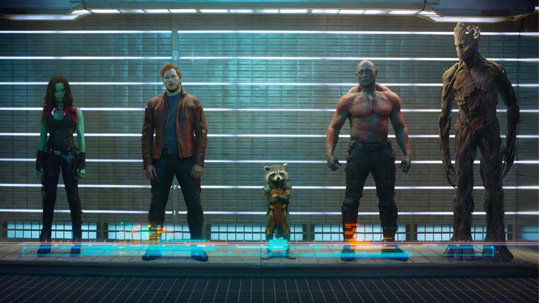 The Guardians of the Galaxy are standing side by side.