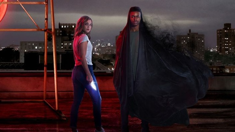 Cloak and Dagger stand on rooftop