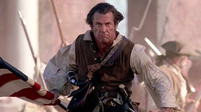 Mel Gibson running with flag