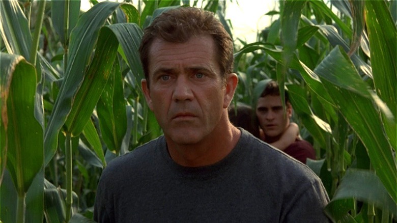 Mel Gibson walking through corn