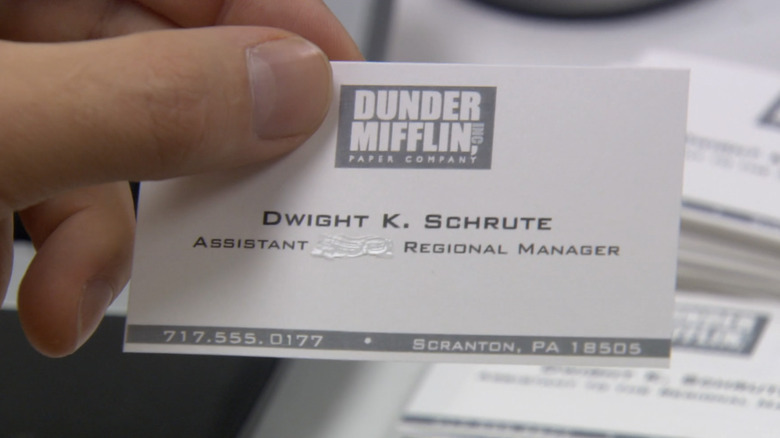 Dwight Schrute's business card with whited out words