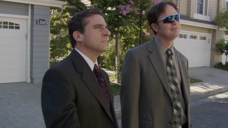 Michael Scott and Dwight Schrute looking at condo