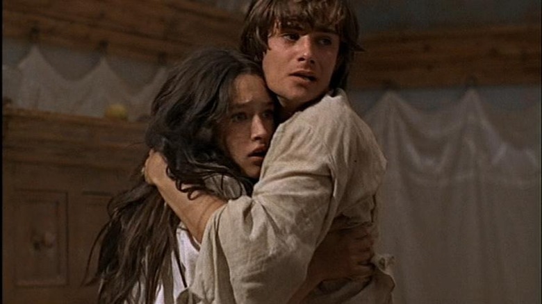 Olivia Hussey and Leonard Whiting embracing