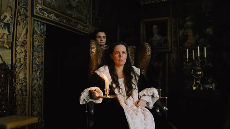 Queen Anne relaxes in her bedroom