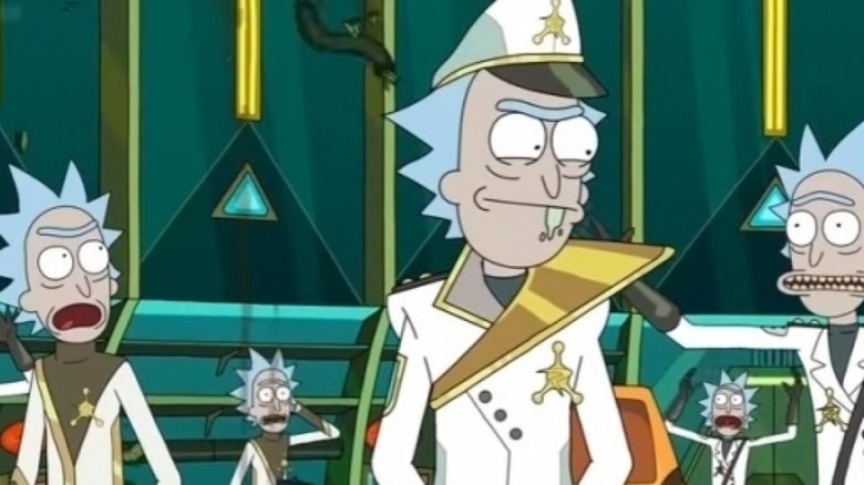 Rick C-137 grins as several other Ricks react in fear