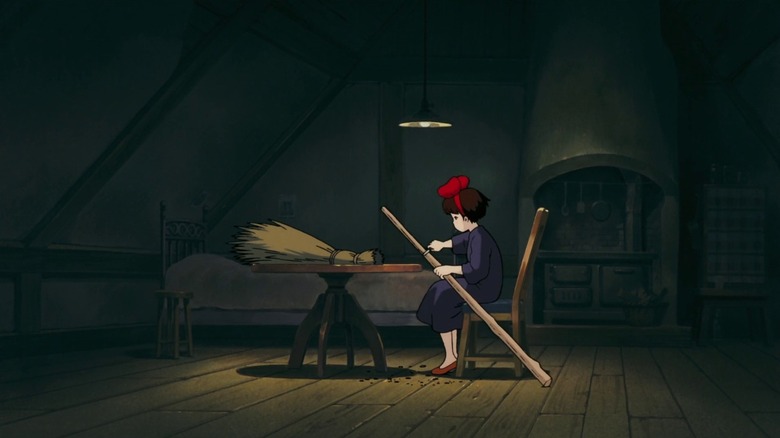 Girl making broom