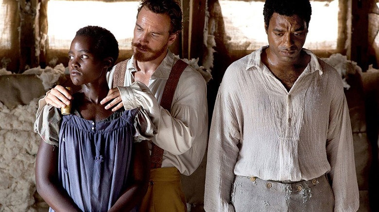 Patsey, Edwin, and Solomon standing