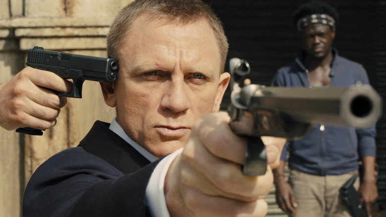 James Bond aims gun