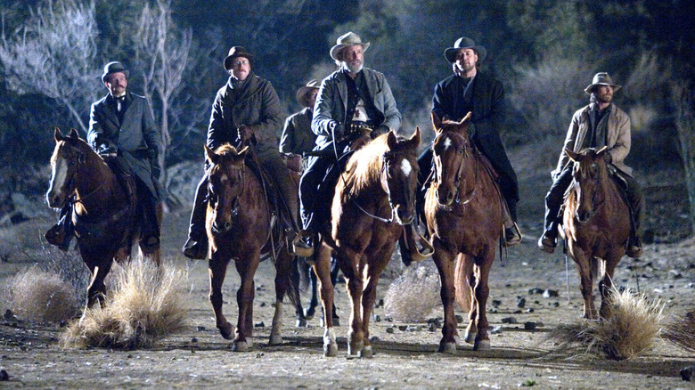 The posse transporting outlaw Ben Wade in the dead of night in 3:10 to Yuma (2007)