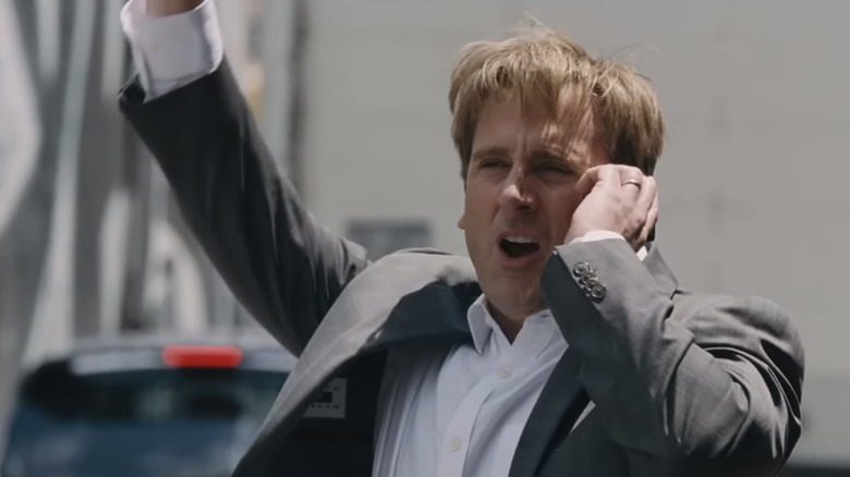 Mark Baum hails a cab in The Big Short (2015)