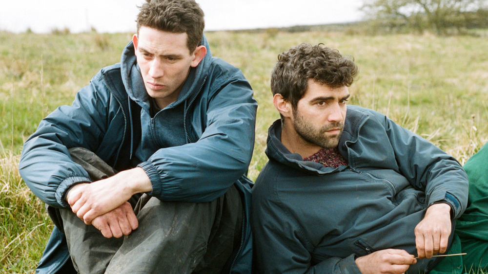 Johnny and Gheorghe sitting in field