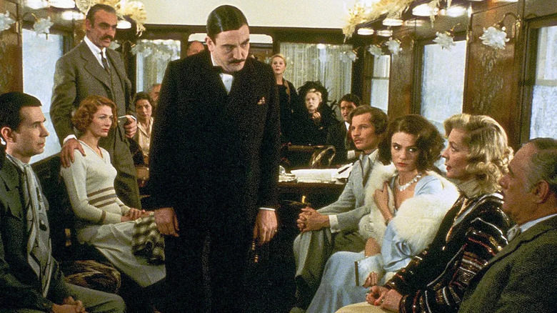 Detective Poirot and passengers