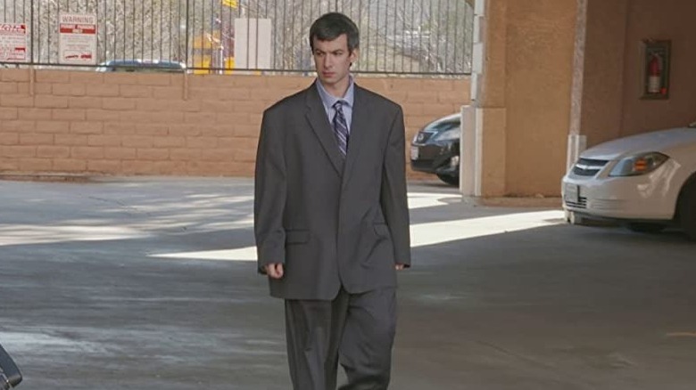 Nathan Fielder in comically large suit
