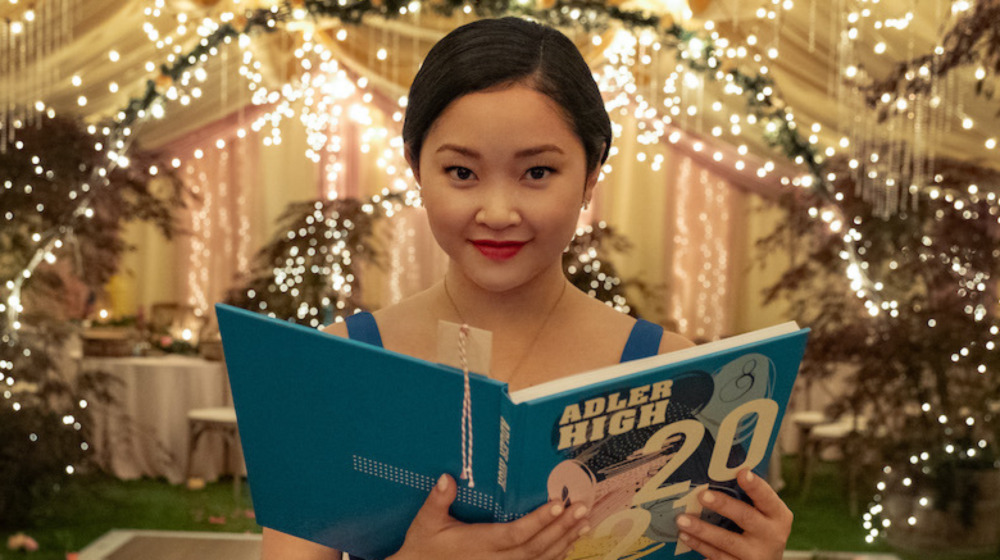 Lara Jean holding yearbook