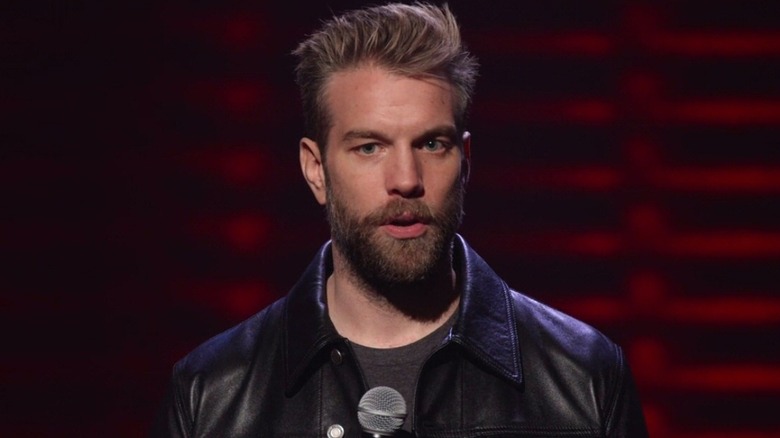 Anthony Jeselnik onstage performing his stand-up special Fire in the Maternity Ward