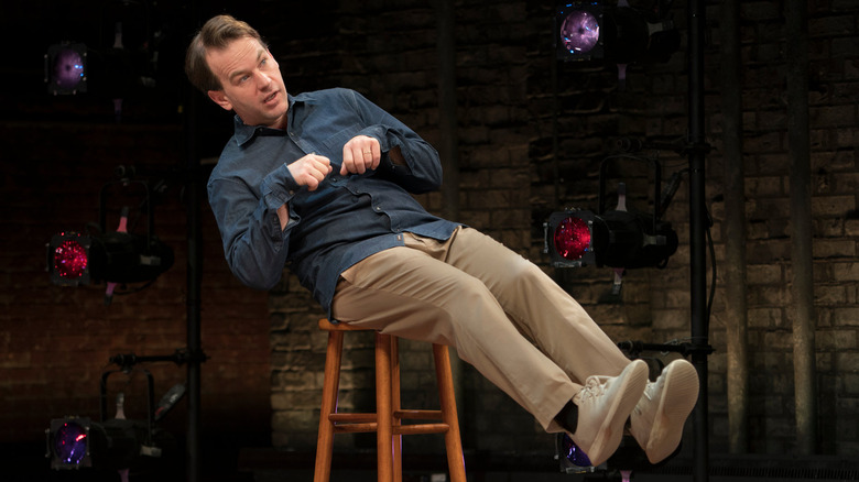 Mike Birbiglia reenacting what it looks like when he's zipped into his sleep-walking bag in The New One