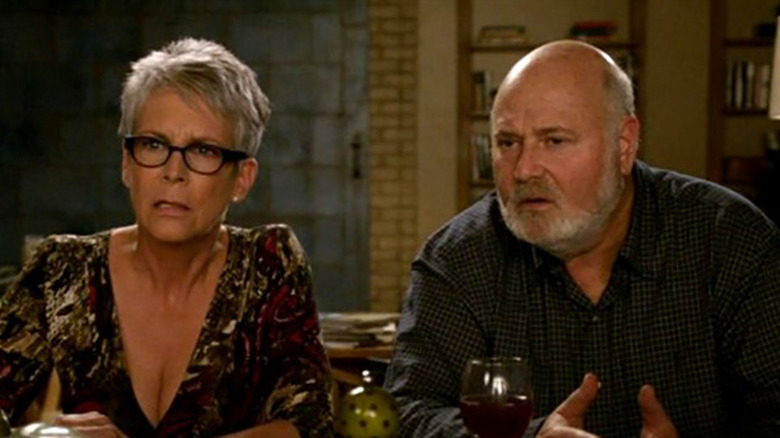 Jamie Lee Curtis and Rob Reiner sit a the table