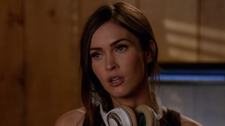 Megan Fox wearing headphones