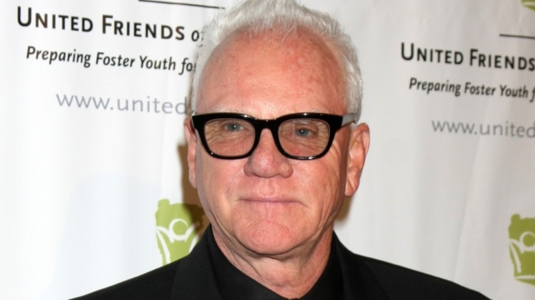 Malcolm McDowell smiling