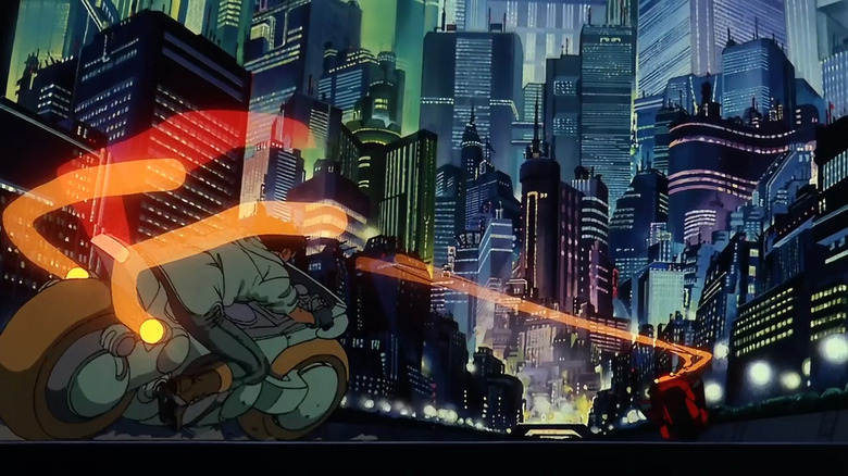 Kaneda and Tetsuo ride motorcycles through Neo-Tokyo