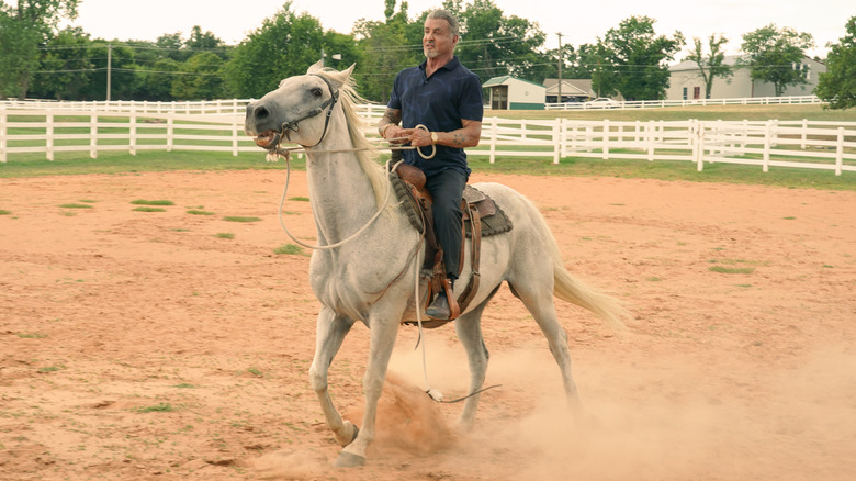 Dwight Manfredi riding a horse