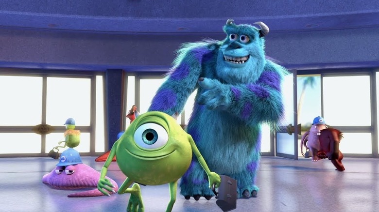 Sulley and Mike waving