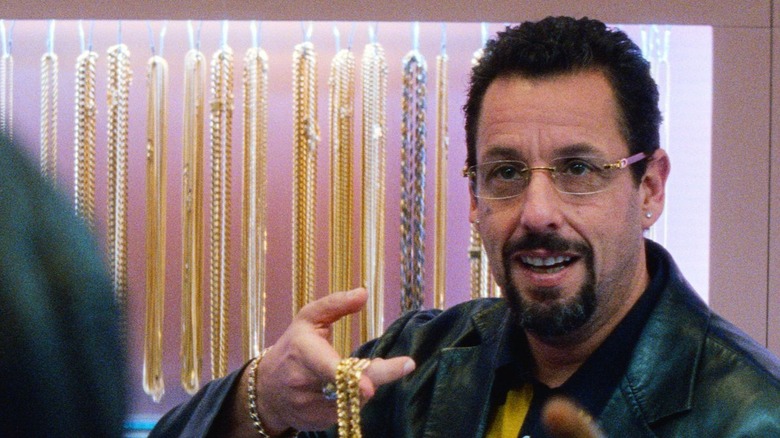 Adam Sandler shows off his wares