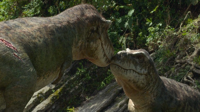 Two dinosaurs preparing to fight 