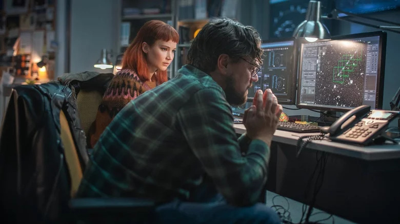 Kate and Randall sit at computers