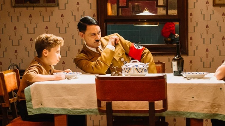 Jojo and Hitler sit at table