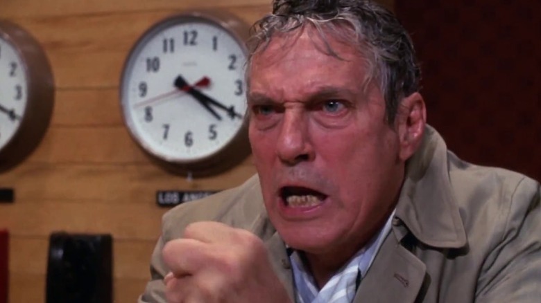 Howard Beale yells angrily