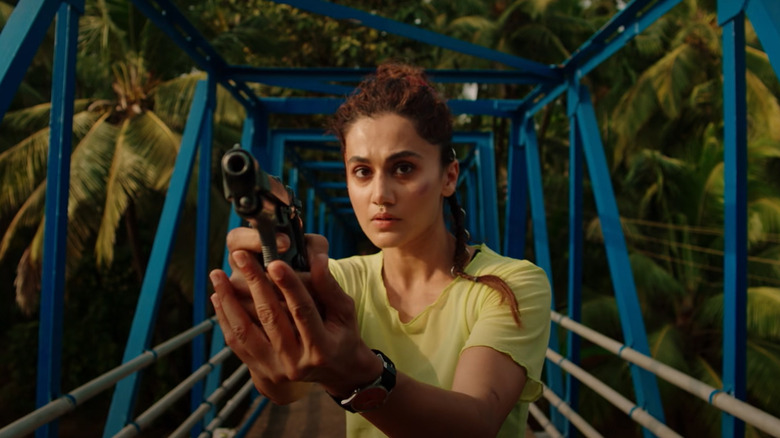 Taapsee Pannu pointing gun